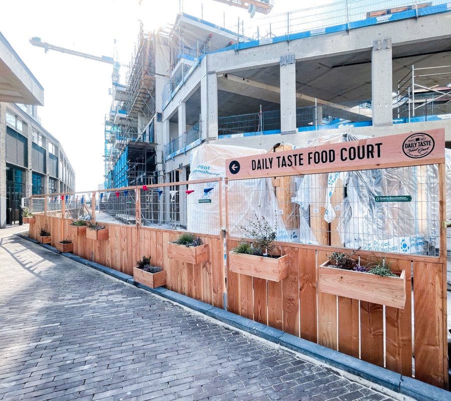 houten signing maatwerk groene bouwhekken SROI Den Haag